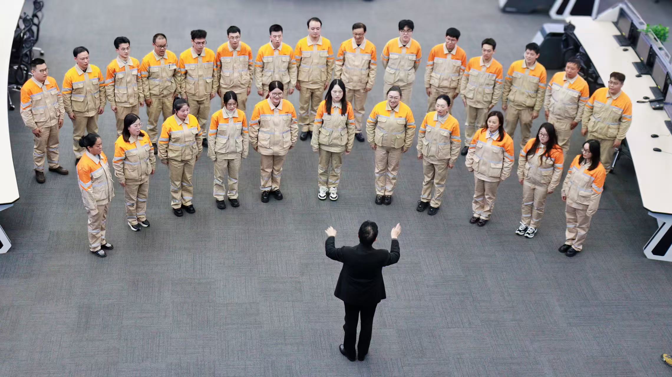 The Wuxi steel workers' choir performs, showcasing their passion for music.